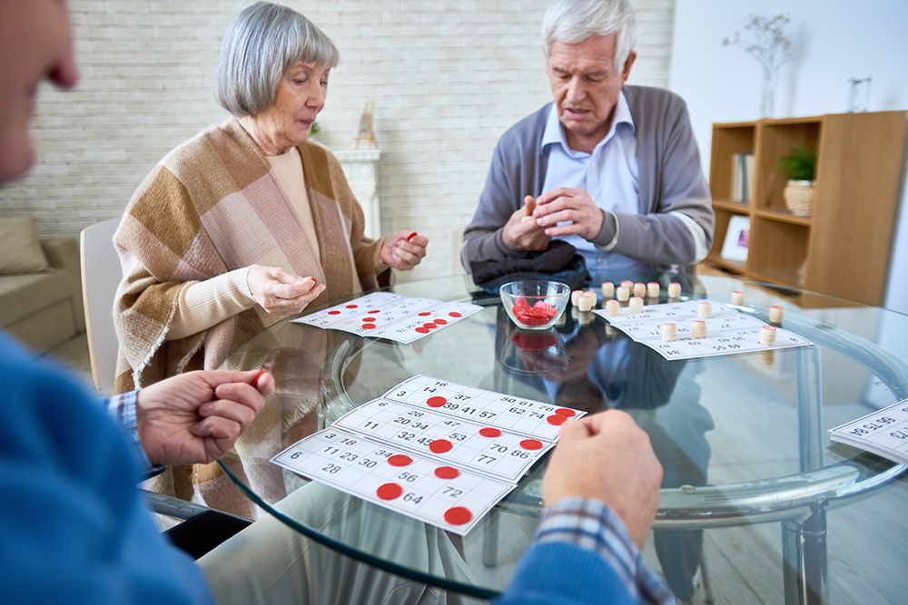 older generation playing bingo at a senior center