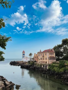 Cascais vacation image of a building on a cliff over the sea